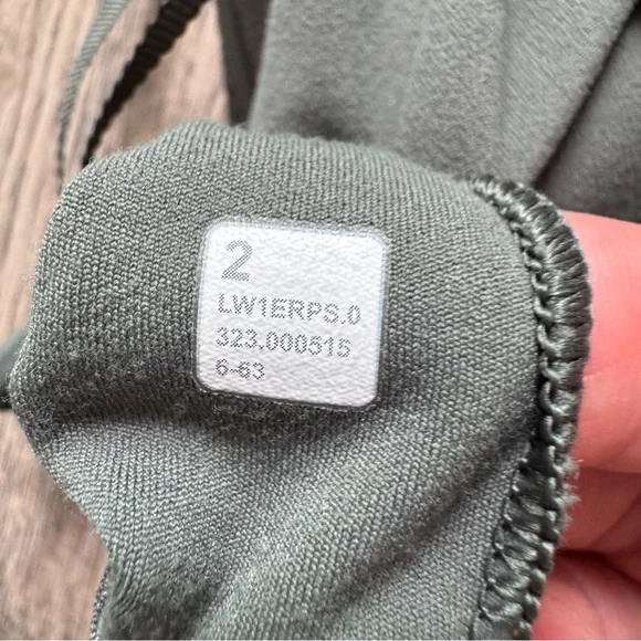 Lululemon Ribbed Nulu Asymmetrical Yoga Tank Top
Dark Forest size 2 - Picture 3 of 5